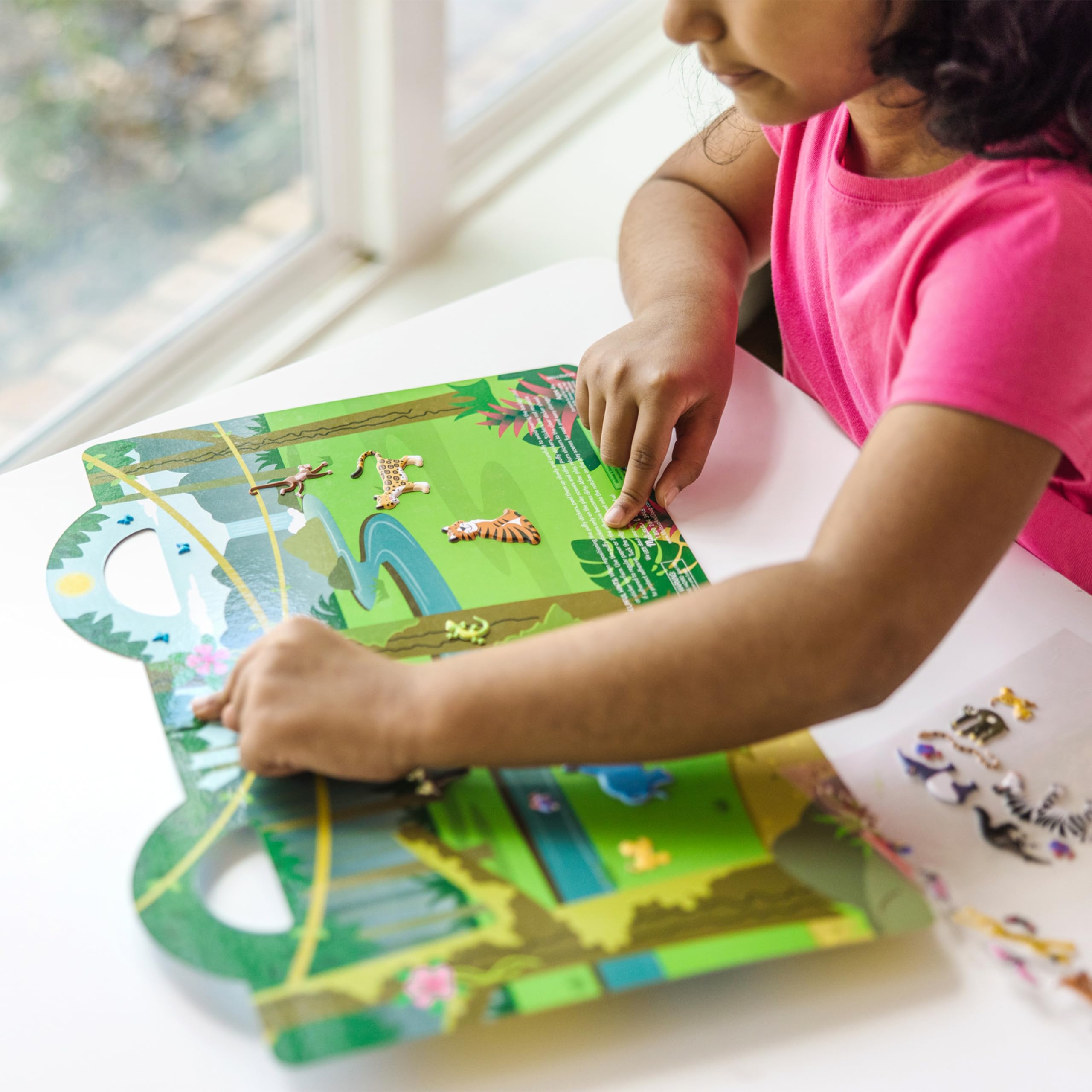 Melissa & Doug sticker mix-and-match encourages creativity and fine motor skills.