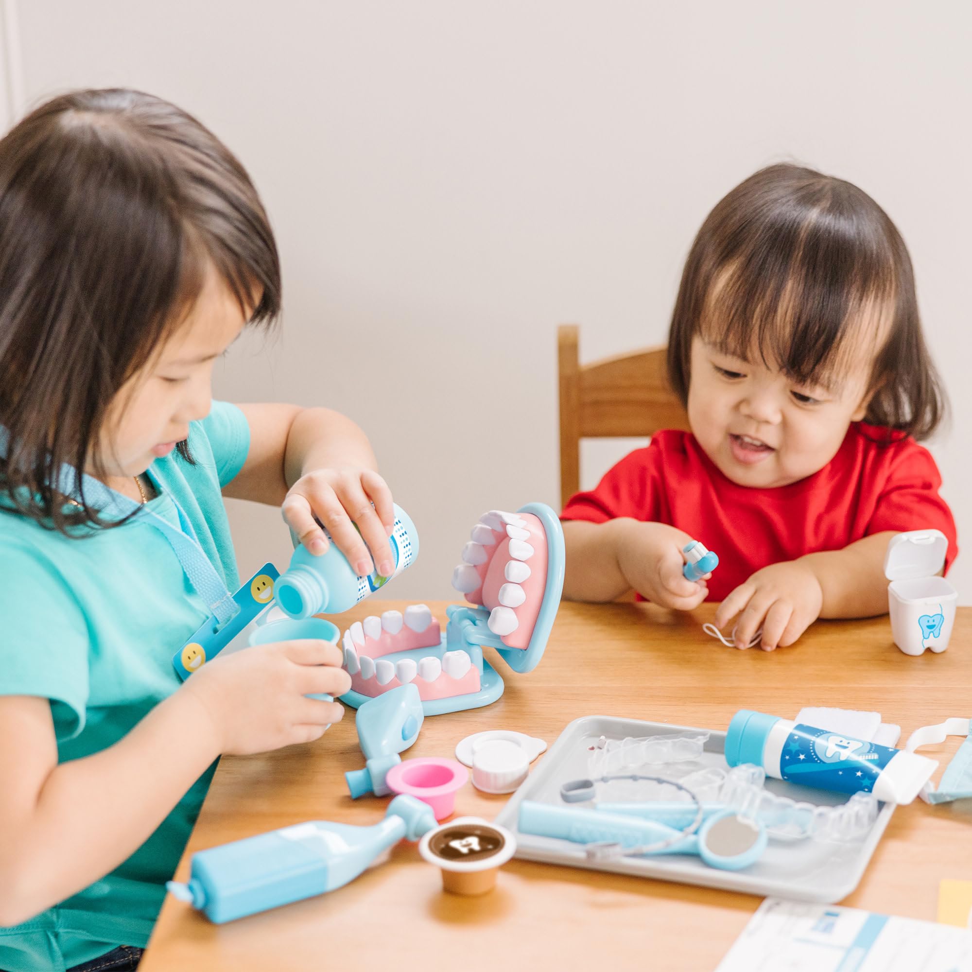 Melissa and Doug dental rinse bottle supports hygienic rinsing during gamified clinics