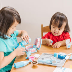 Melissa and Doug dental rinse bottle supports hygienic rinsing during gamified clinics