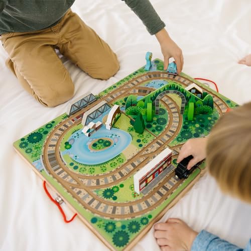 Melissa & Doug Take-Along Railroad compact design is ideal for travel time.