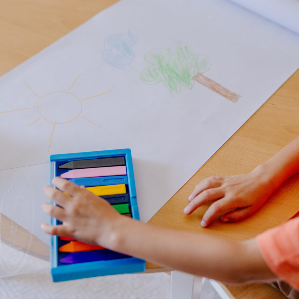 Melissa & Doug triangular crayons in flip-top case for portable art sessions.