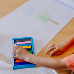 Melissa & Doug triangular crayons in flip-top case for portable art sessions.