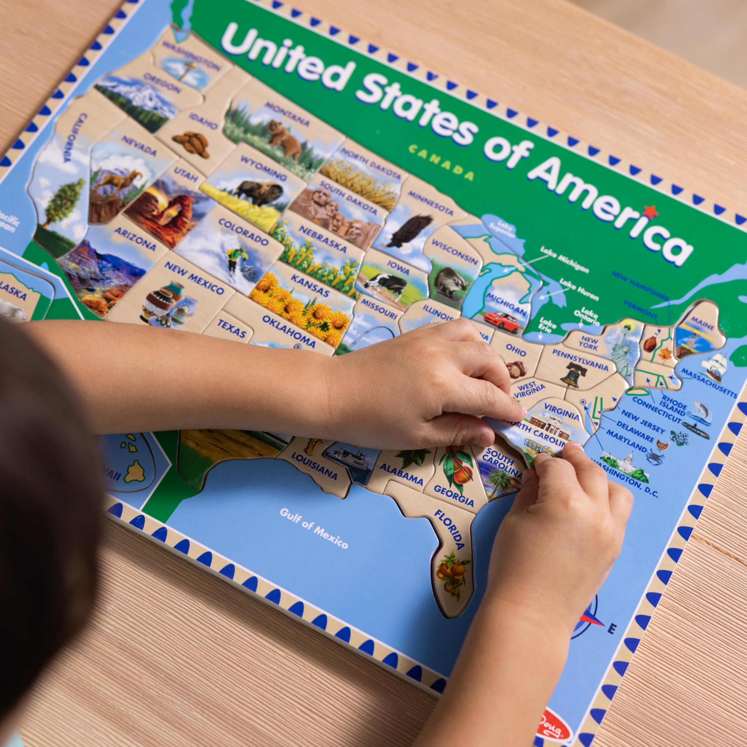 Melissa & Doug USA Map shows capitals under each piece for memory-friendly recognition.