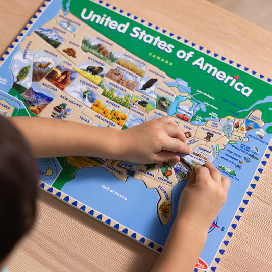 Melissa & Doug USA Map shows capitals under each piece for memory-friendly recognition.