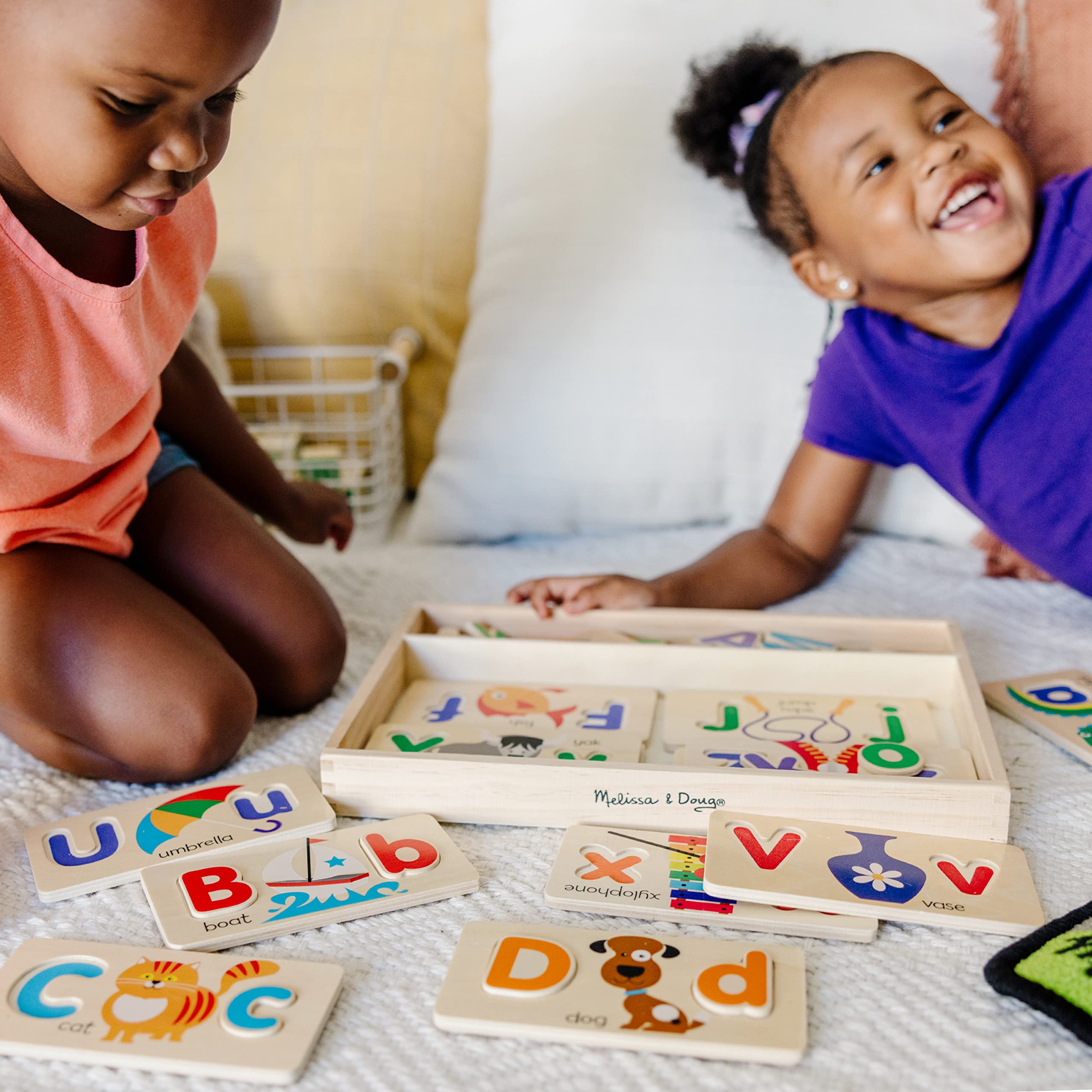Melissa and Doug watch illustration board aids letter-sound association