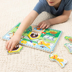 A child solving a Melissa & Doug peg puzzle demonstrates focused play