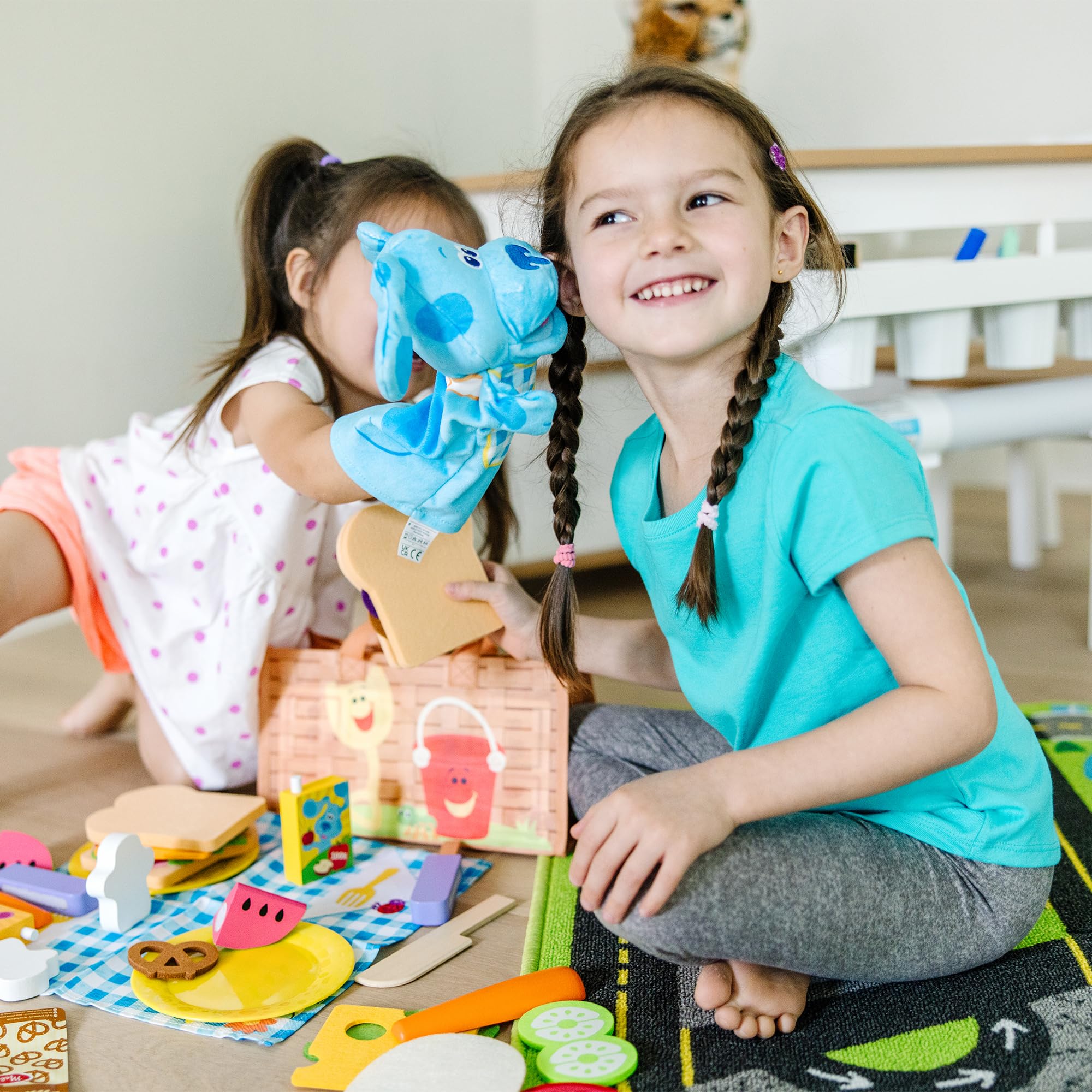 Melissa & Doug wooden play food slices for creative sandwiches.