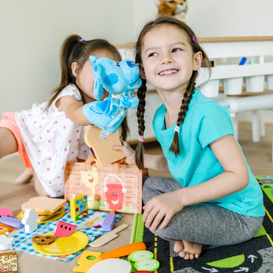 Melissa & Doug wooden play food slices for creative sandwiches.