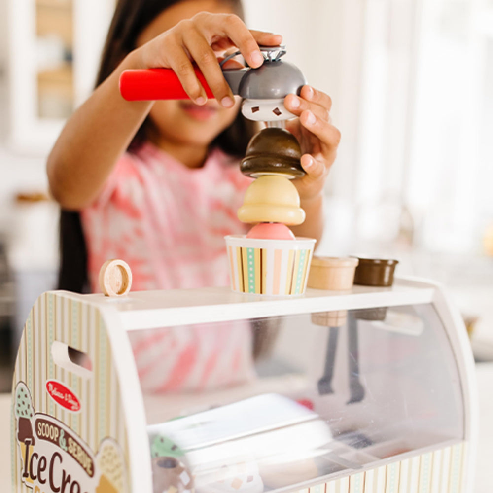 Melissa & Doug close-up of wooden scoops highlighting textures and easy-grip design