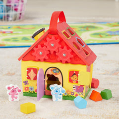 Melissa & Doug wooden-shaped blocks in bright colors for sorting.