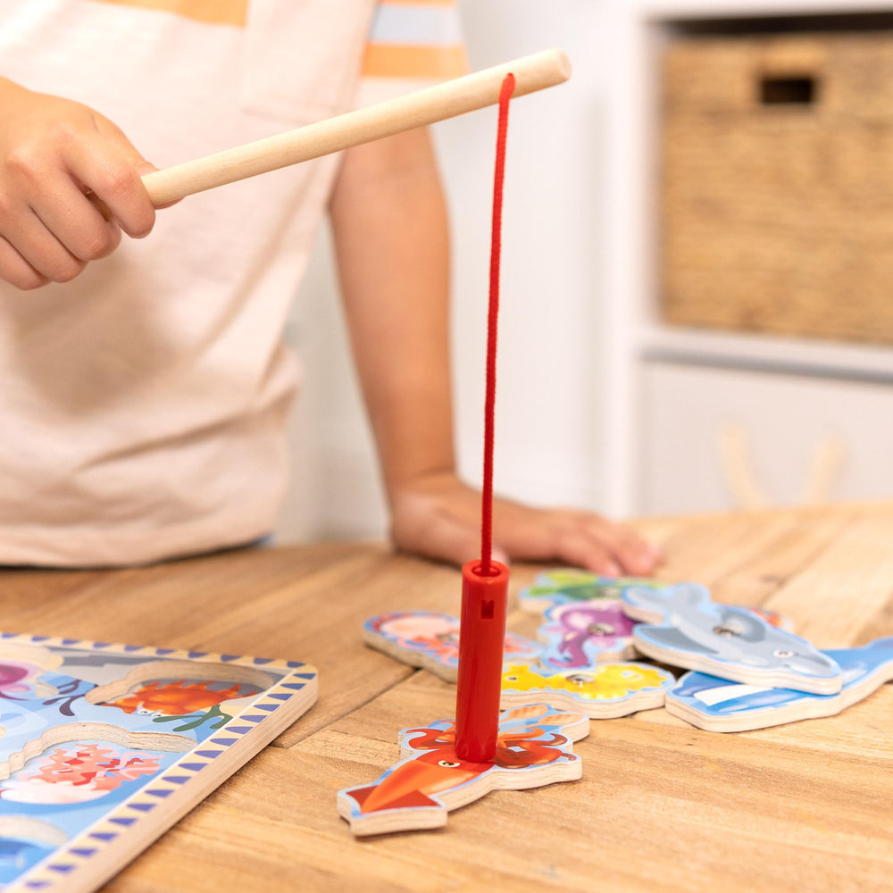 Wooden toy designed to develop motor skills during screen-free fun.