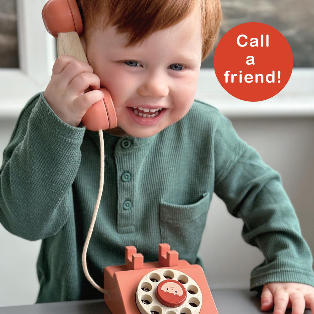 Classic wooden design of Mentari Ring Ring Telephone for timeless play spaces.