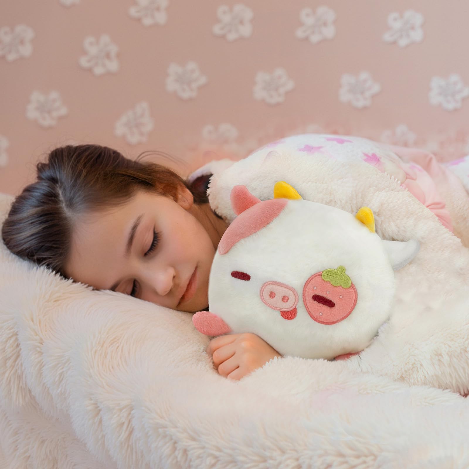 Mewaii Strawberry Cow Plush sleeping pose on bed for bedtime comfort