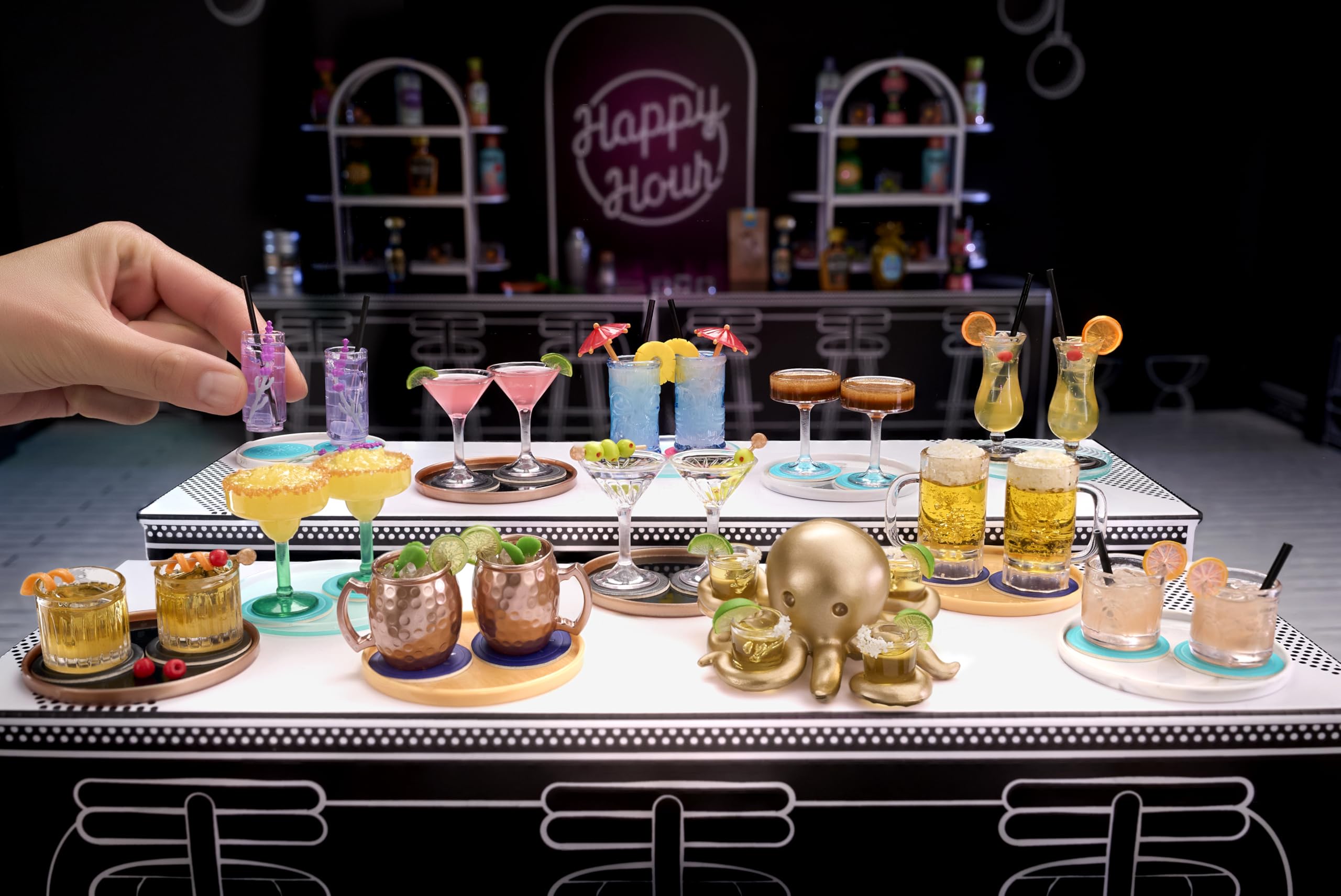 MGA's Miniverse Make It Mini Happy Hour bar cabinet ball display holding finished mini cocktails.