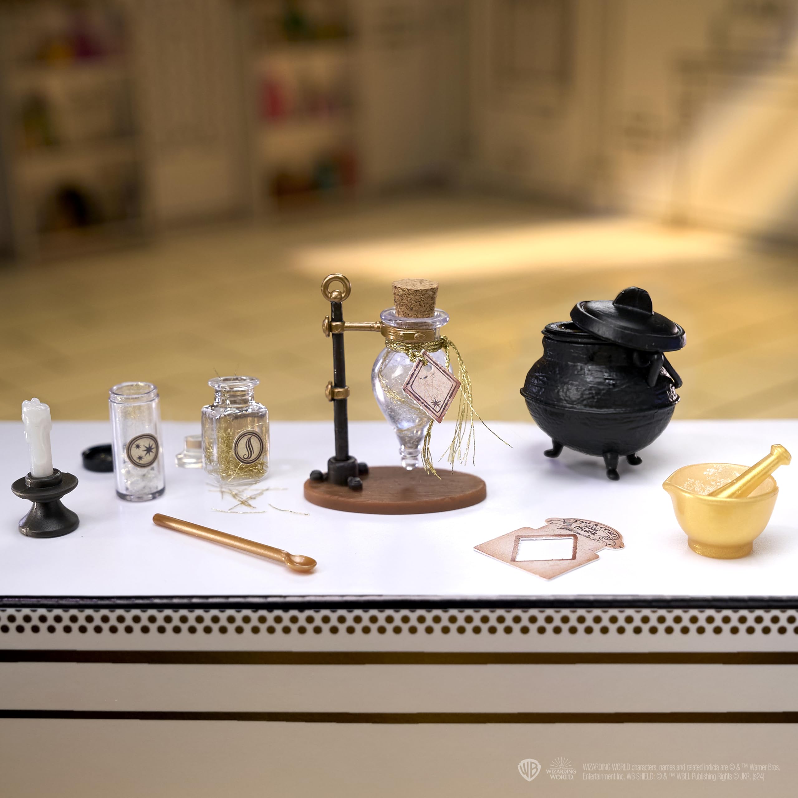 MGA's Miniverse display bottle and table-stand enhances shelf showcases.