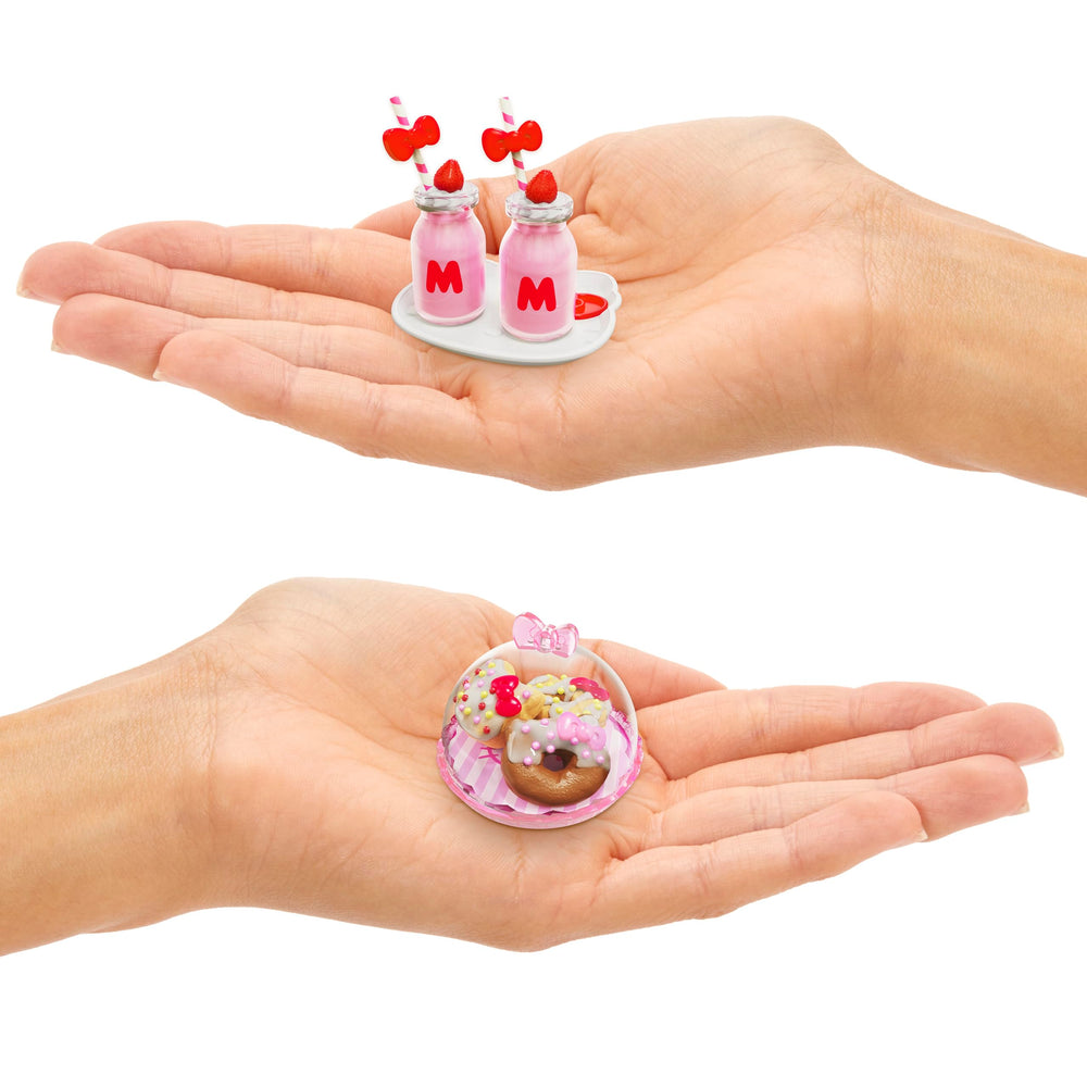 MGA's Miniverse Hello Kitty display case showcases finished minis on tiny tables.