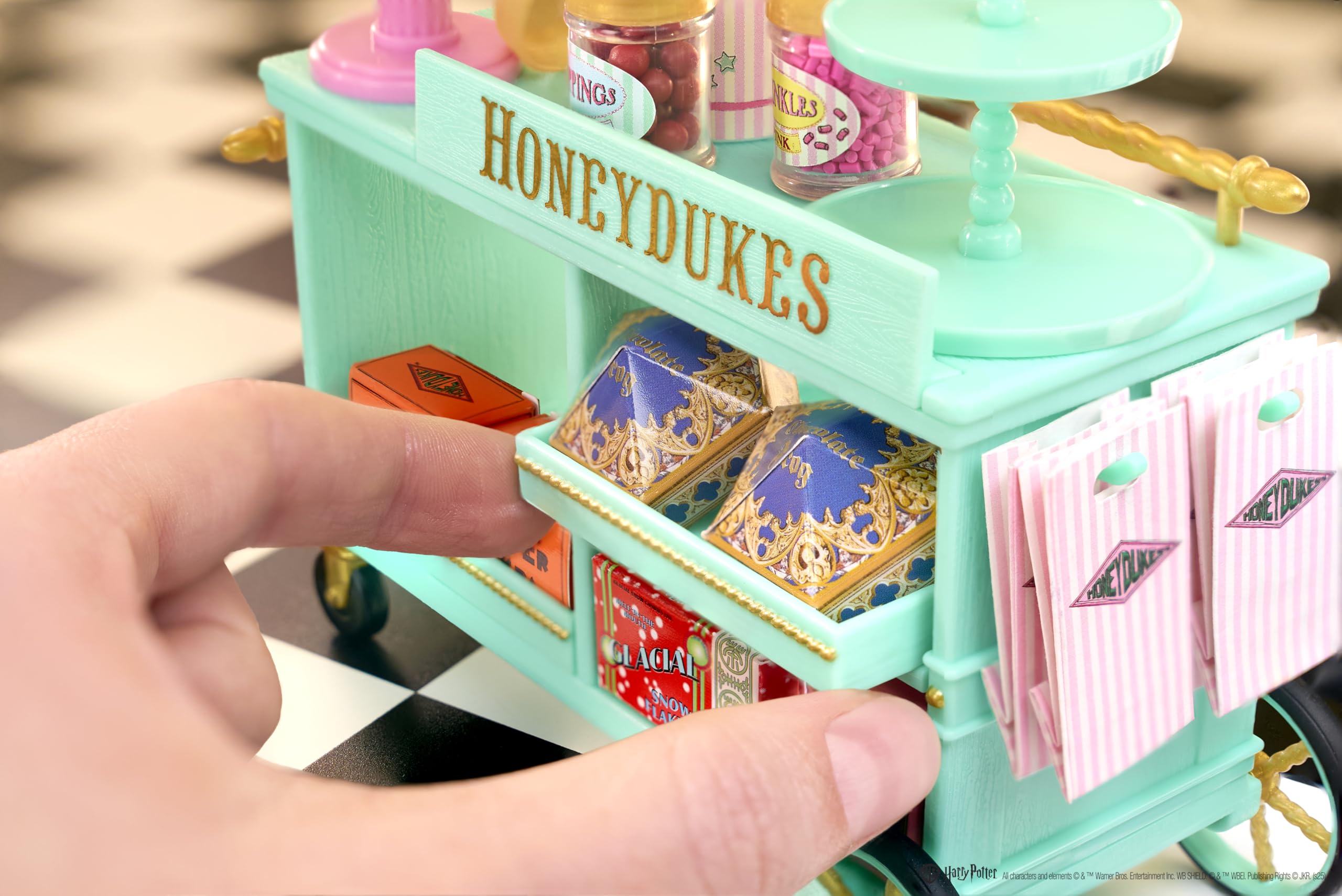 MGA's Miniverse Honeydukes mini boxes and jars for authentic shelves.