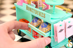 MGA's Miniverse Honeydukes mini boxes and jars for authentic shelves.