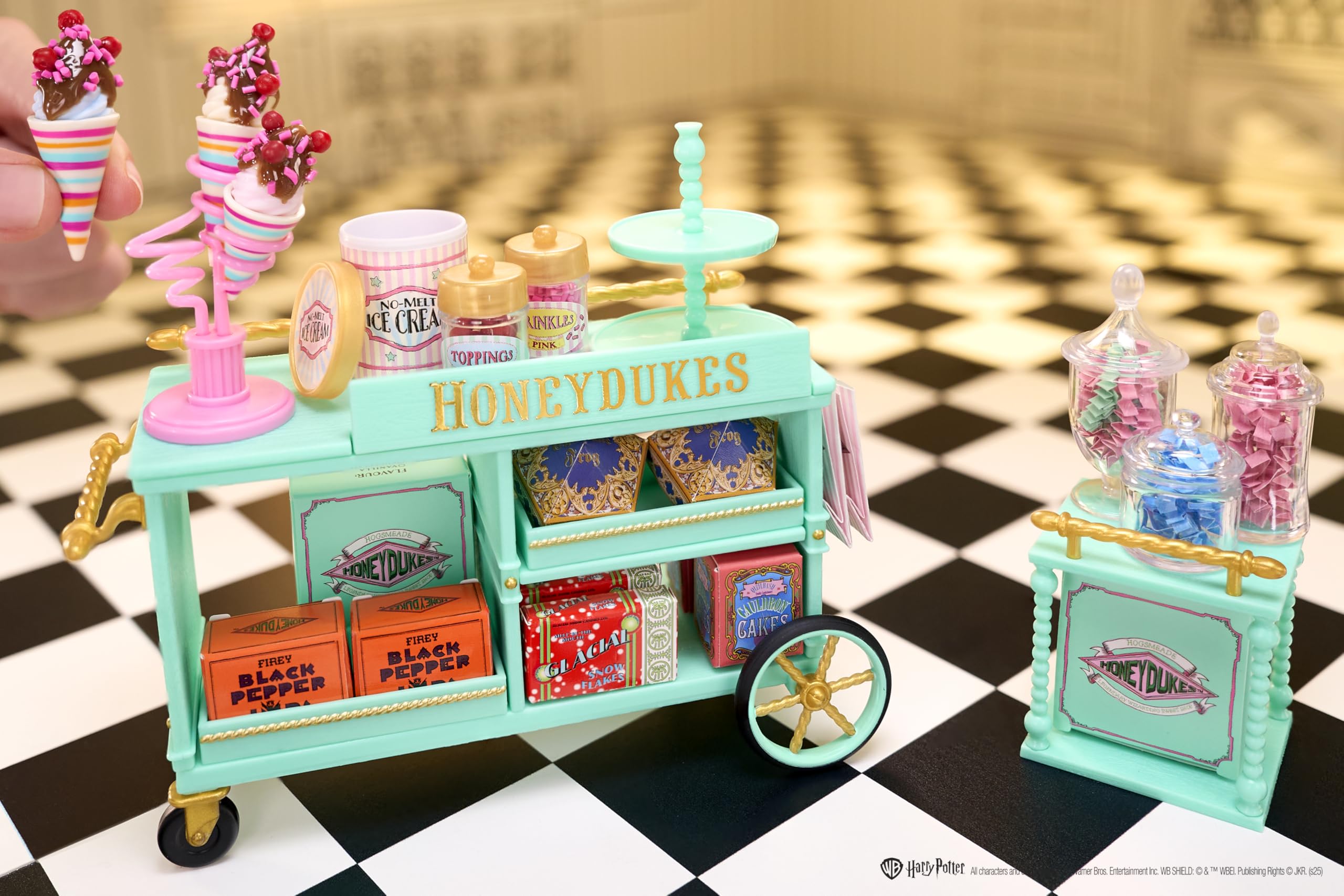 MGA's Miniverse Honeydukes trolley detailed panels enhance sturdy assembly.