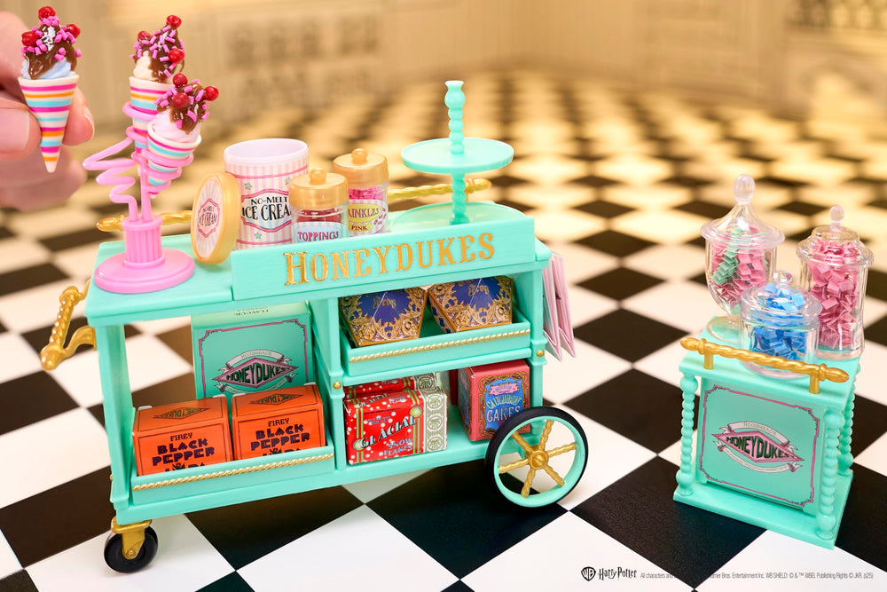 MGA's Miniverse Honeydukes trolley detailed panels enhance sturdy assembly.