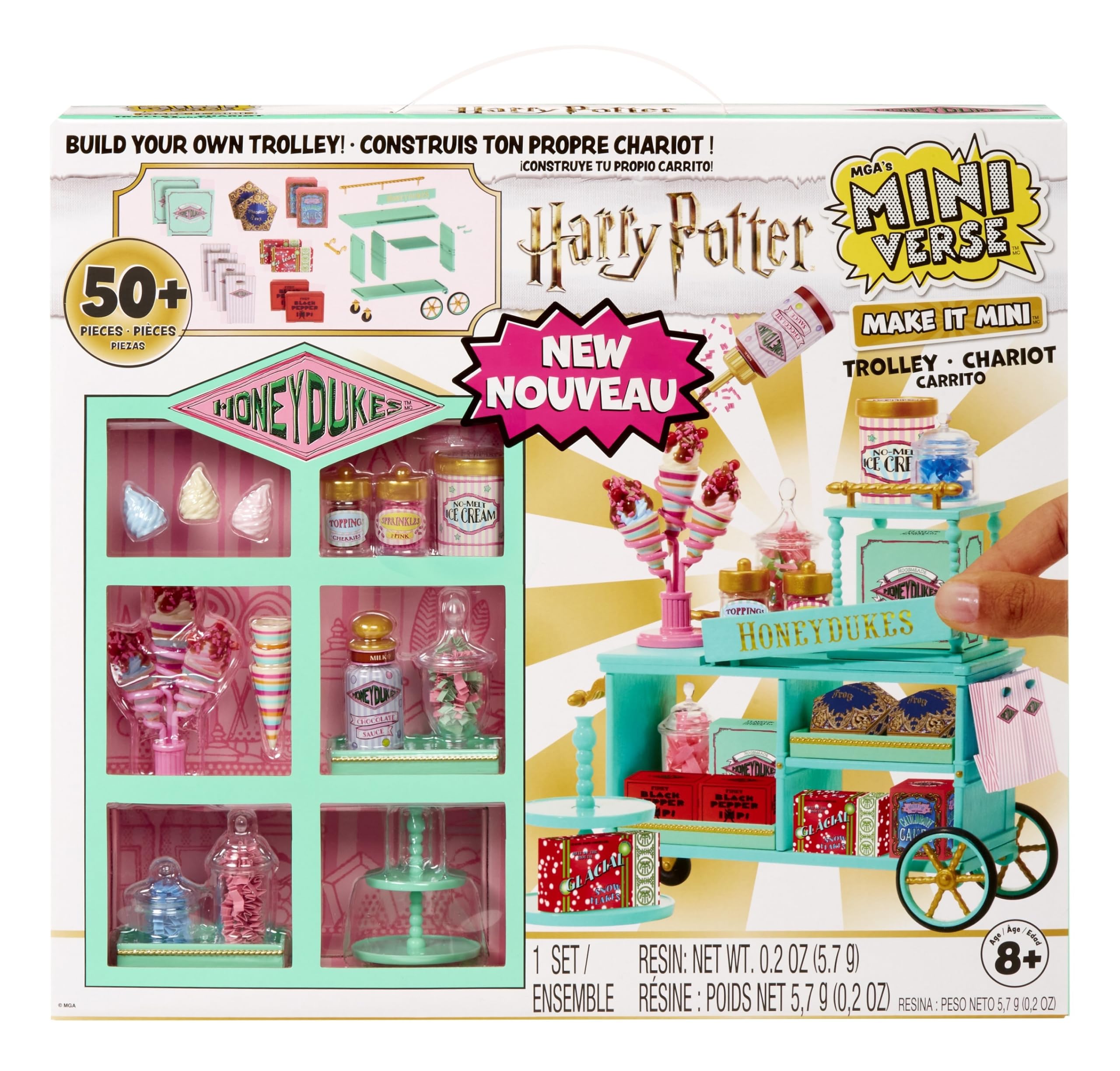 MGA's Miniverse Make It Mini Honeydukes Trolley pieces ready for display.