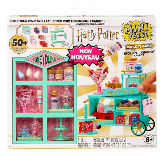 MGA's Miniverse Make It Mini Honeydukes Trolley pieces ready for display.