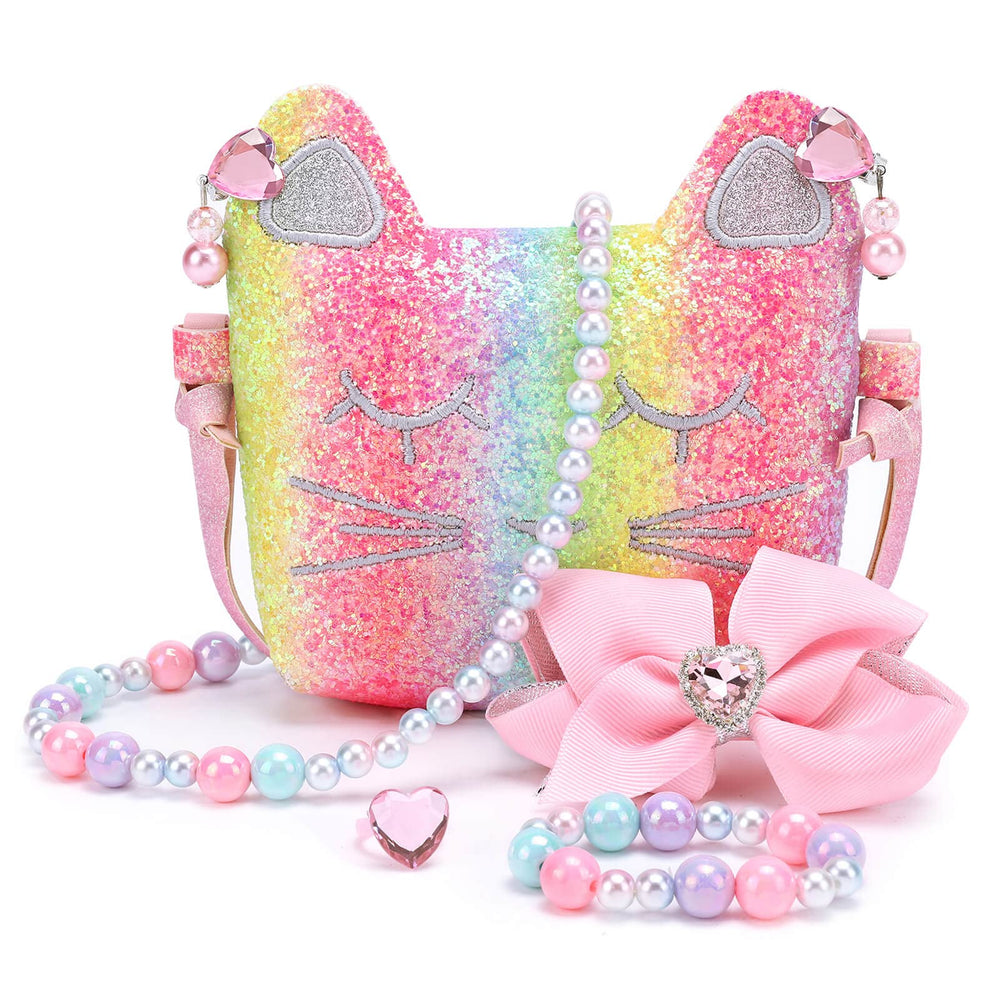 Mibasies purse for little girls with dress-up appeal and glittery finish.