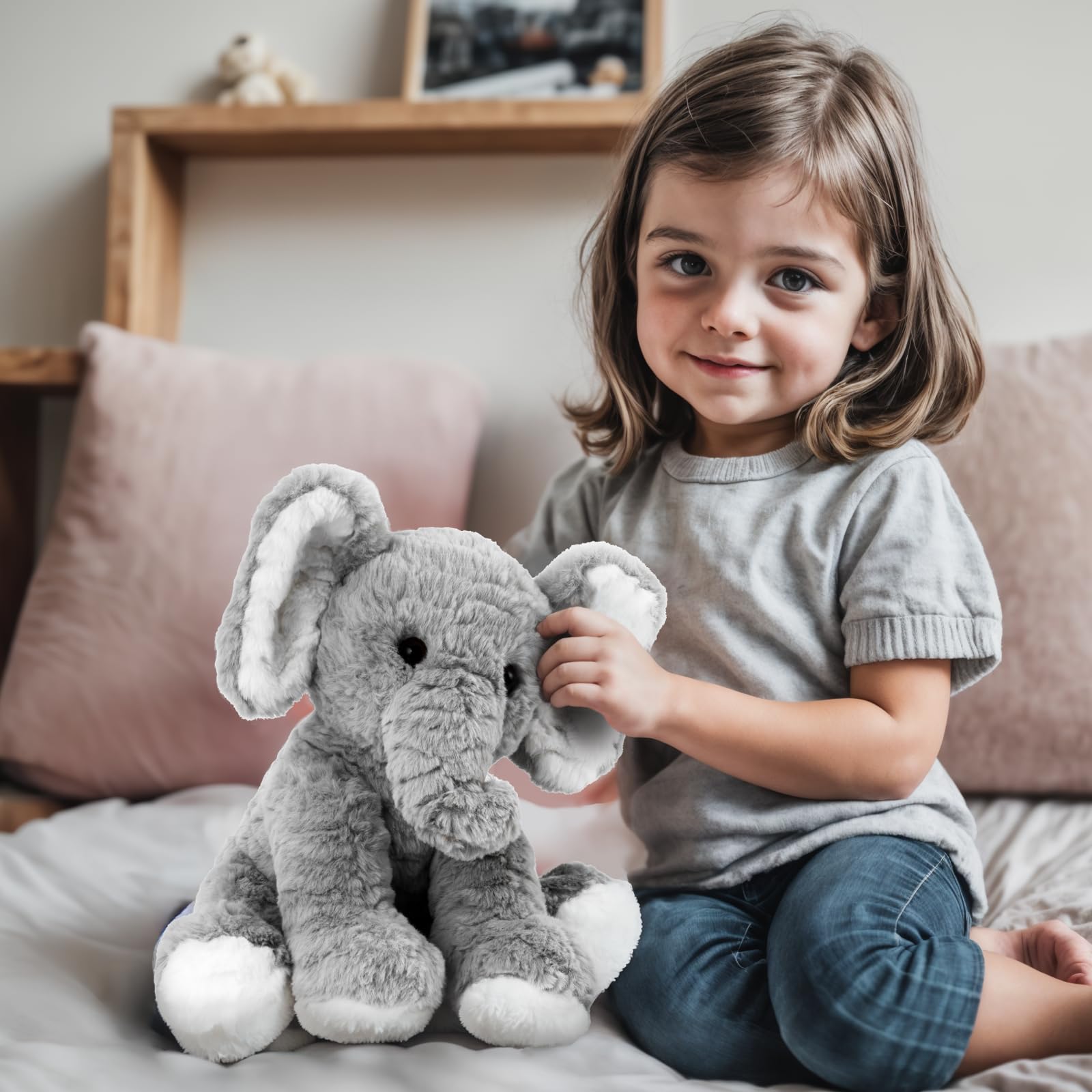 Mikee Fluffie elephant plush with long soft fur for gentle touch.
