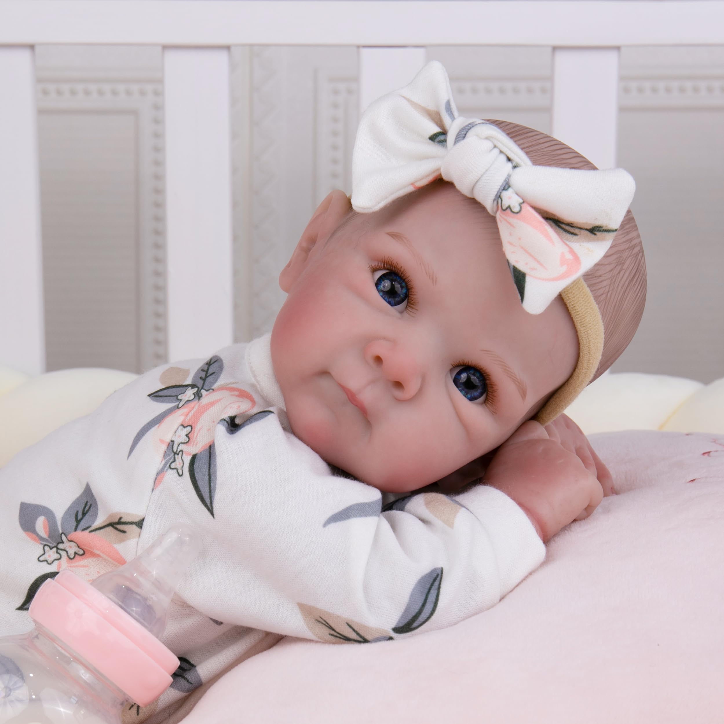 Milidool lifelike reborn doll girl - hand-painted hair detail for authentic charm.