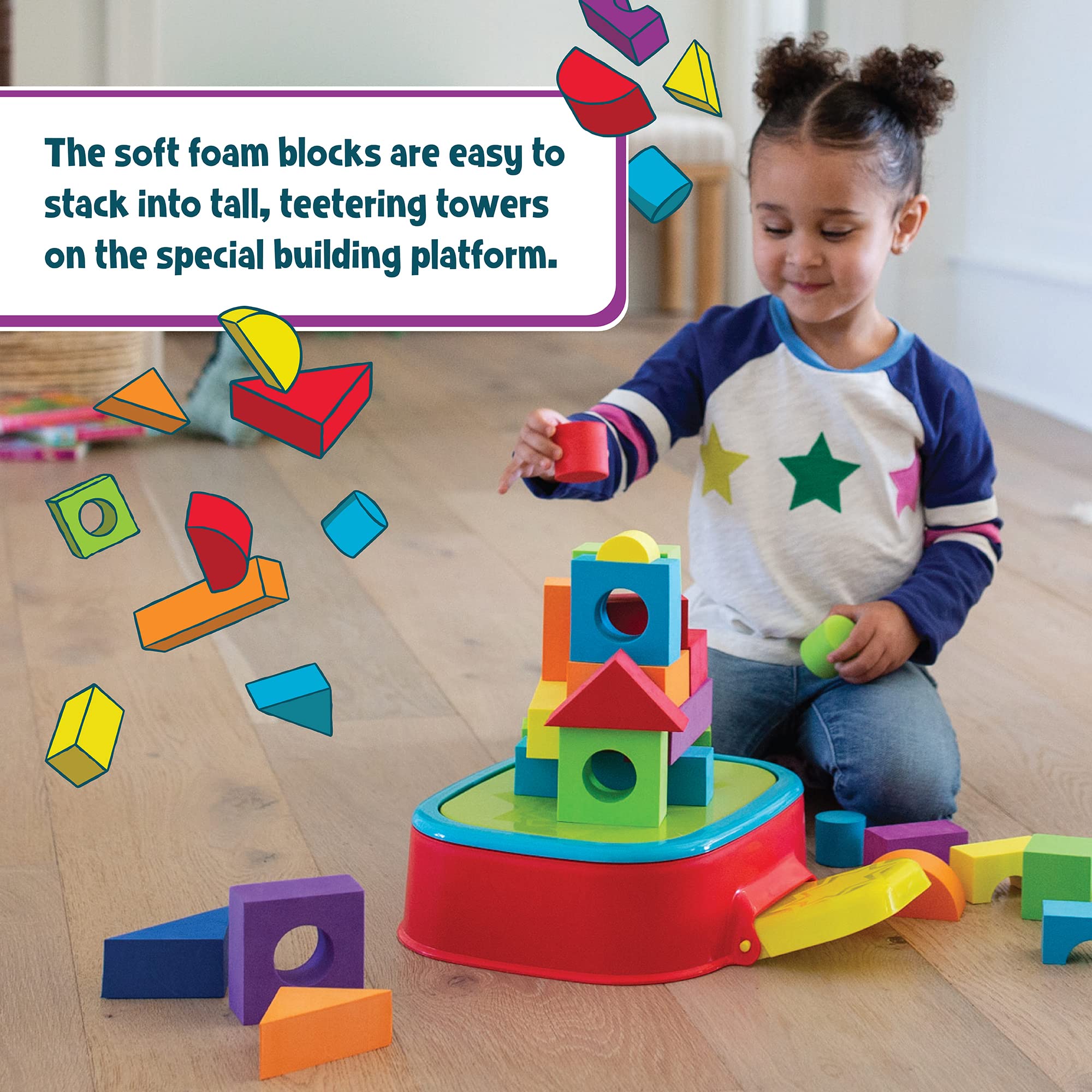 Child enjoys hands-on KaBlocks Blast play with blocks and launch action.