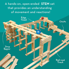 MindWare KEVA Contraptions two balls inside kit for marble testing and motion experiments.