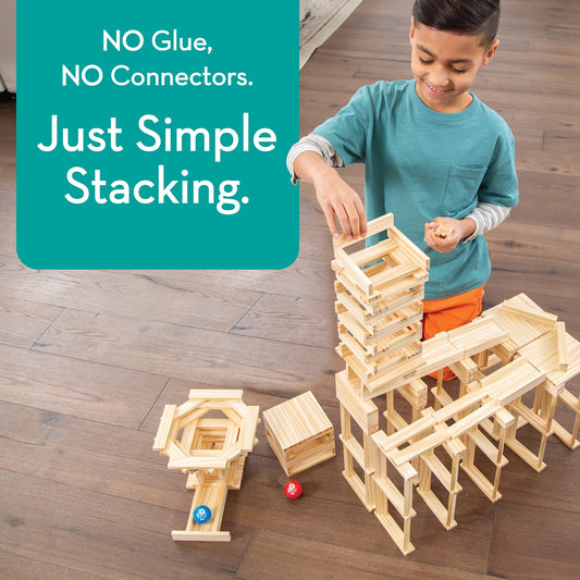 MindWare KEVA Contraptions marbles in motion demonstrating marble run potential and smooth motion.