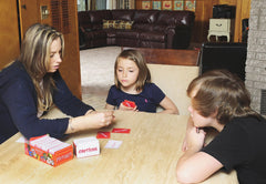 MindWare PicWits play scene shows players enjoying a lively session.