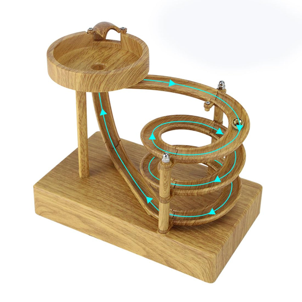 MISDENK kinetic art perpetual motion base on wood grain desk offers a calming focal point.