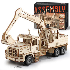 MOCBURIKU Excavator puzzle parts laid out for precise assembly and calm focus.