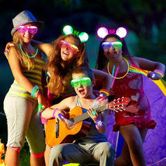 Mocoosy neon party gear on people enhances nighttime visibility and fun.