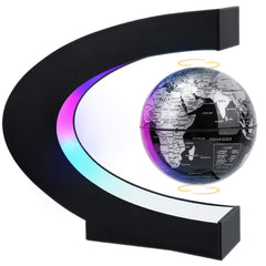 MOKOQI levitating globe stand enhances a futuristic desk centerpiece.