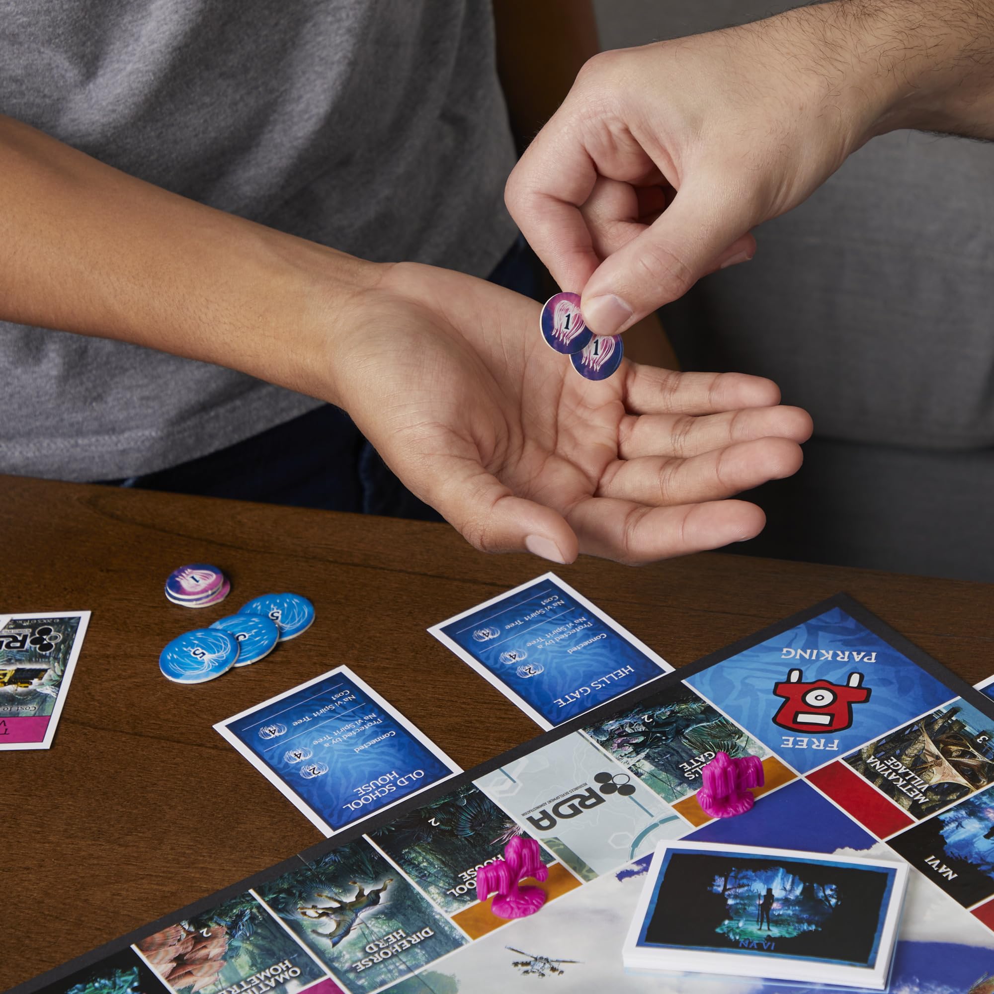 Monopoly Avatar Edition Na’vi Spirit Tree guarding locations during play.