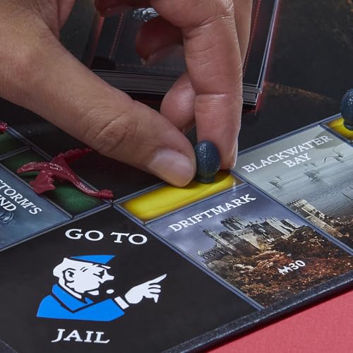 Players plan moves during a tabletop setup for strategy.