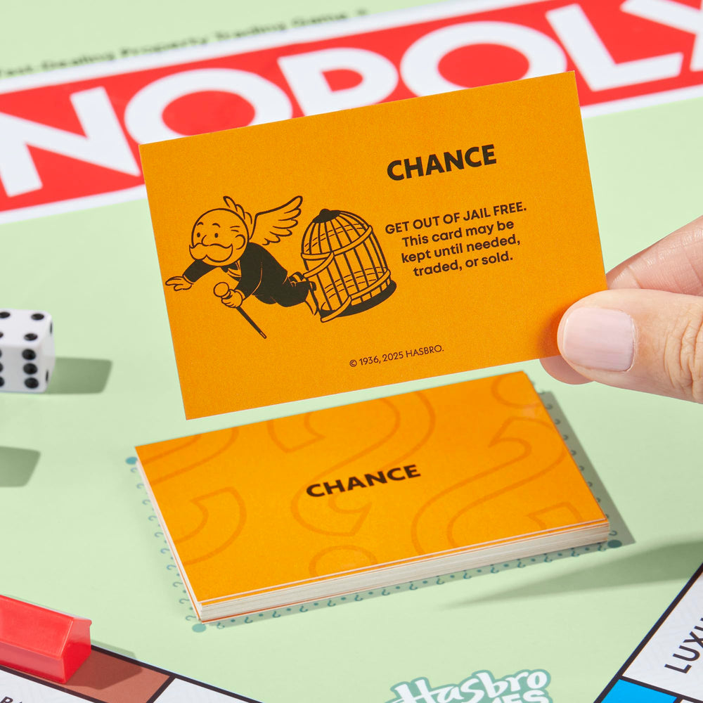 Players gathered around a table enjoying Monopoly, Monopoly brings family game nights together