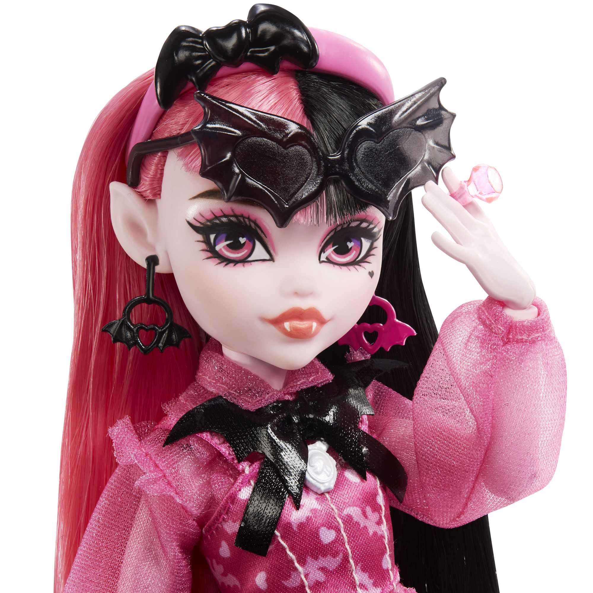 Monster High Draculaura batty sunglasses and headband complete a spooky-chic look.
