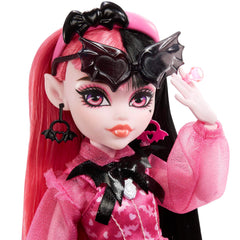 Monster High Draculaura batty sunglasses and headband complete a spooky-chic look.