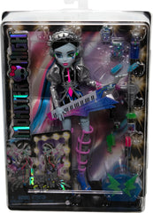 Monster High Frankie Stein with backstage beauty essentials for quick styling between acts.
