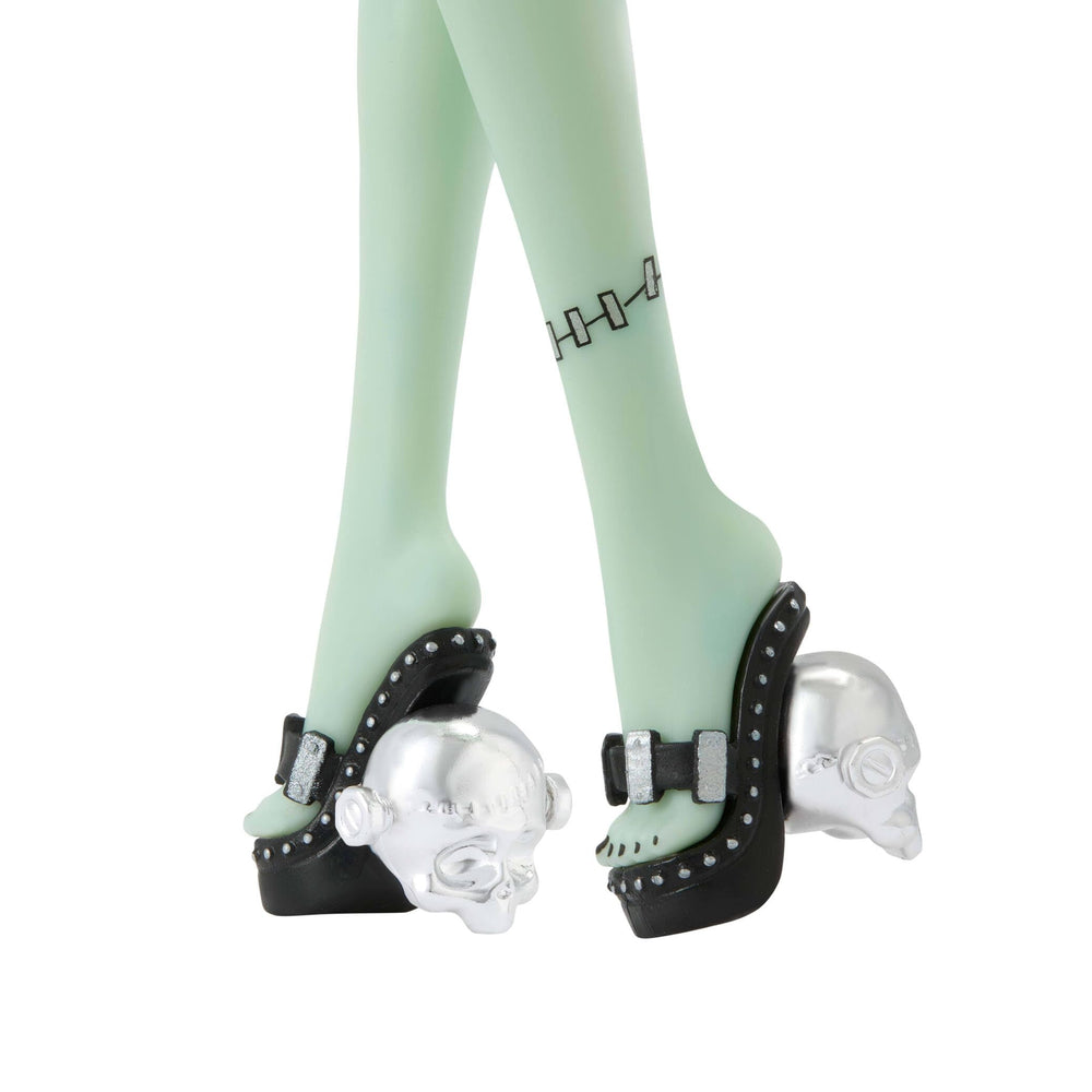 Mesh elbow-length gloves give Frankie Stein a chic, theatrical vibe.