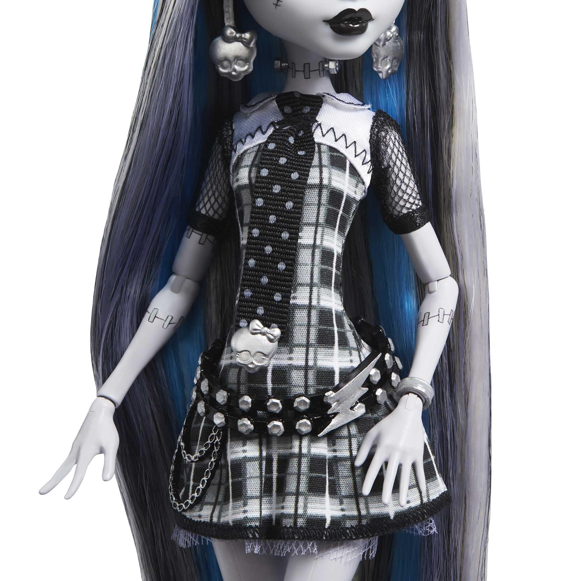 Monster High Frankie Stein in plaid mini dress showcases bold monochrome drama.