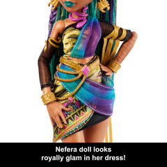 Nefera De Nile with purse for stylish pretend outings and accessorizing.