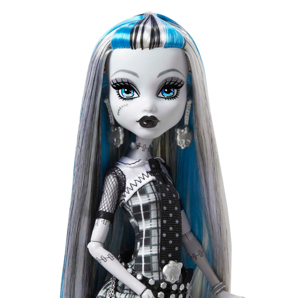 Watzie the dog figure with Monster High Frankie Stein for playful display and storytelling.