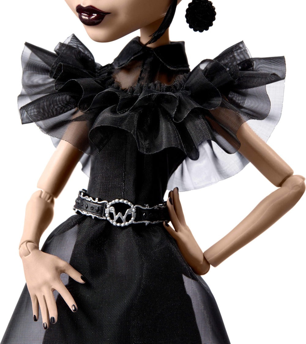 Monster High Wednesday Raven N doll accessories including belt and earrings for collectors.