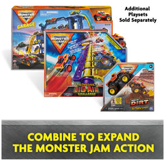 Garage accessories and sign complete an authentic Monster Jam setup