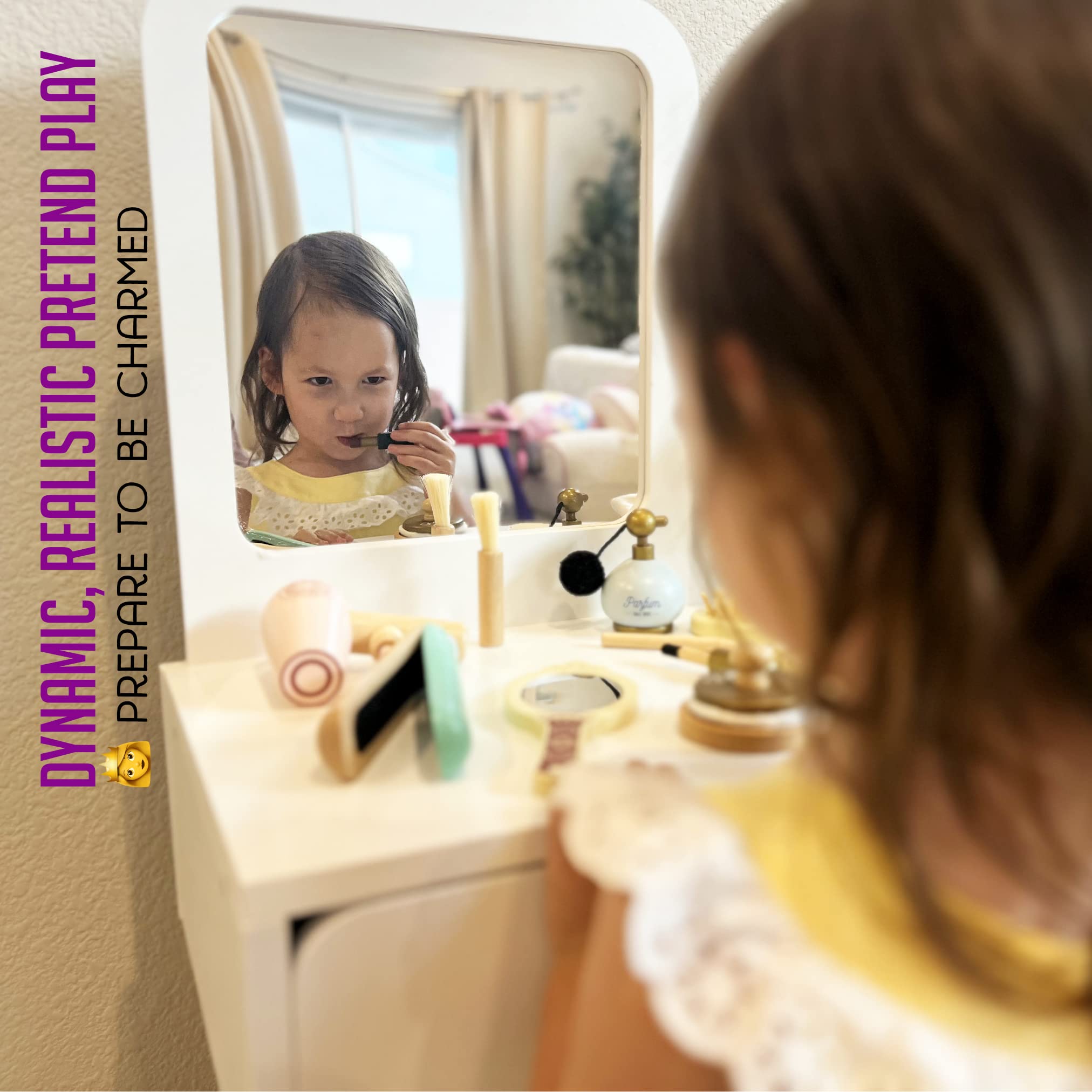 Montessori Mama wooden hairbrush encourages fine motor skills during pretend styling